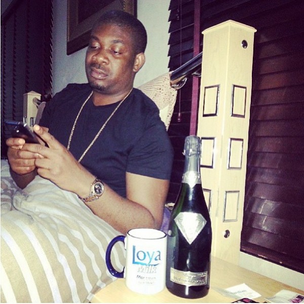 Don Jazzy poses with the infamous N290m 'Taste of Diamonds' champagne