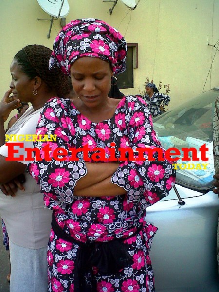 Late Fatai Rolling Dollar's wife Sherifat Olagunju weeps at the family residence, Oko Oba, Lagos. Photo: Victor Enengedi