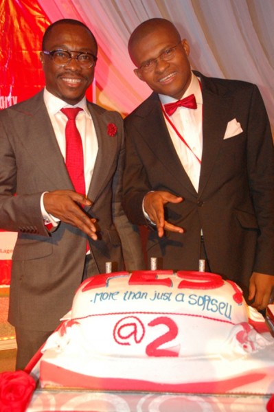 Yes Magazine 2nd annual lecture and cocktail party - Azuh Arinze and Julius Agwu cutting the cake