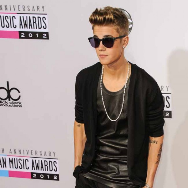 Justin Bieber at the 40th Anniversary of the American Music Awards held at L.A. Live's Nokia Theatre in Los Angeles, California. photo: Bang Showbiz
