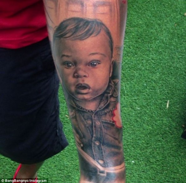 Part of Henry's new tattoo shows a baby which could be his daughter Tea