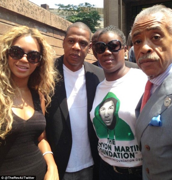 Trayvon's mother Sybrina Fulton, third from left, was joined by Beyonce, Jay Z and the Rev Al Sharpton. Photo:Dailymail