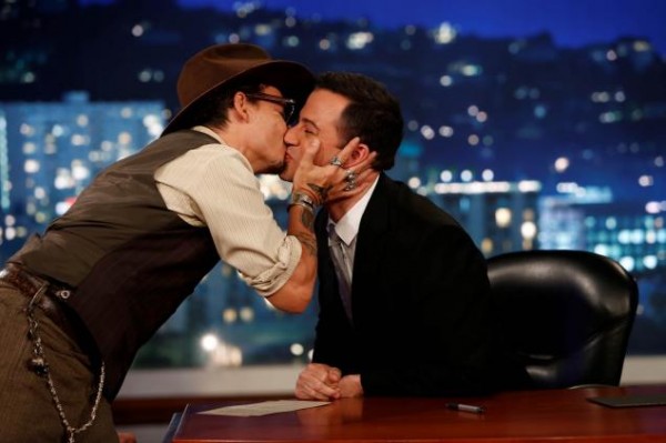 Johnny Depp, Jimmy Kimmel lock lips. Photo: USweekly