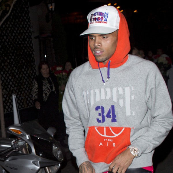 Chris Brown wasted no time after turning himself in for a short Jail stint today as he was seen leaving 'AV nightlcub' with a Mystery Blonde girl in Hollywood, CA. Photo: Bangshowbiz