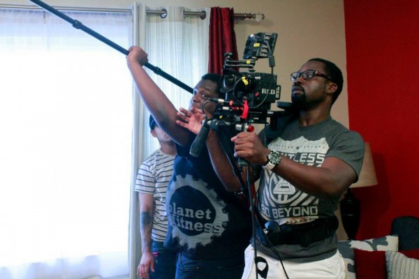 Daniel Ademinokan on set shooting