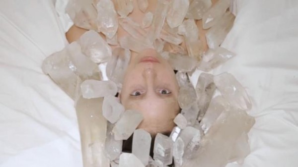 Lady Gaga surrounds herself in crystals to end the intriguing series of scenes.