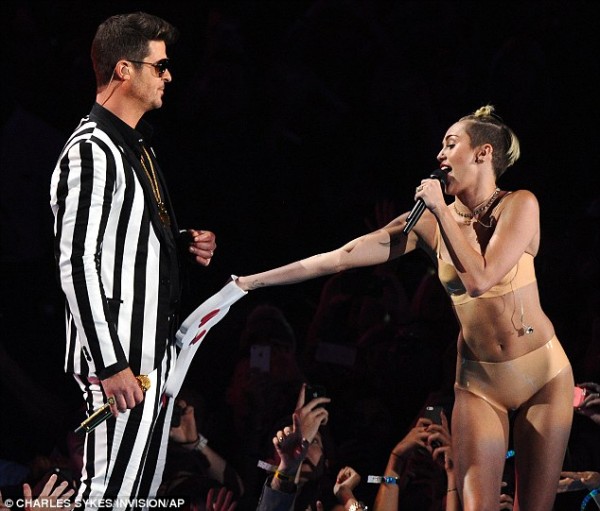 Miley Cyrus 'raunchy dances' with Robin Thicke at the 2013 MTV Video Music Awards