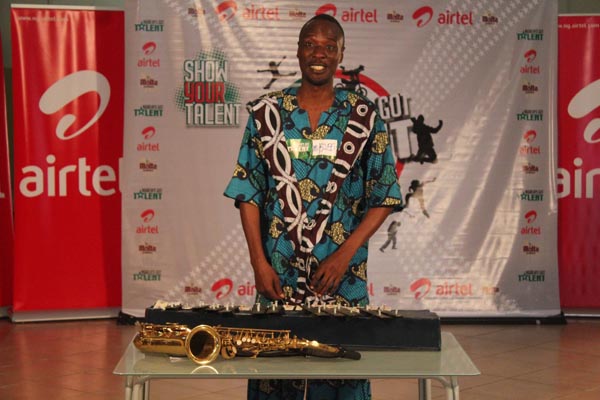 Agogo oba...Traditional xylophonist