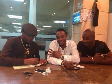 Harrysong pictured at his signing unto Five Star Music in mid 2013