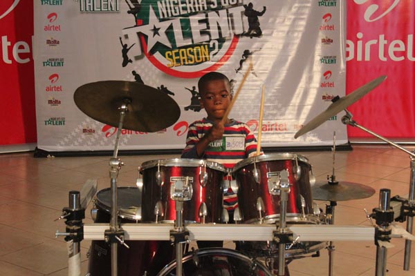 Little drummer doing his thing