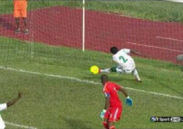 Super Eagles defender clears the ball which is seen to have already crossed the goal line.