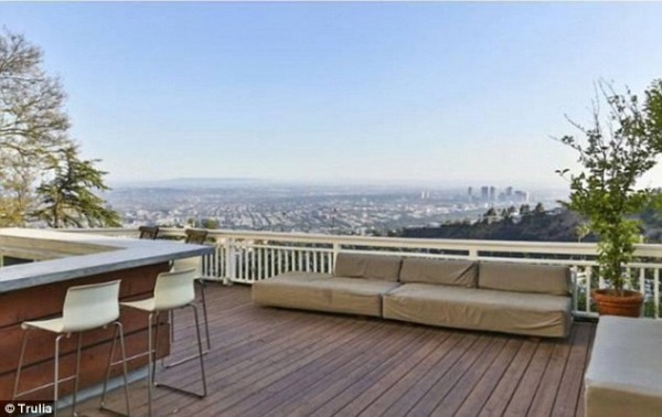 The prime piece of real estate is perched on a hill and looks out over Los Angeles