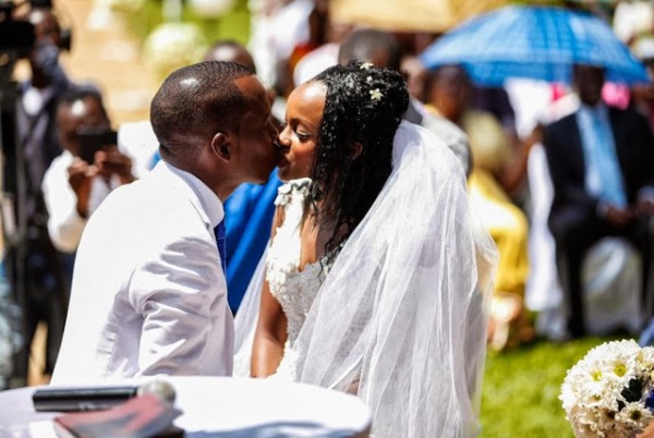Tim Njiru and his bride, Pamela Gatwiri during their wedding at the Oak Place Hotel wedding grounds on Sunday October 12, 2013