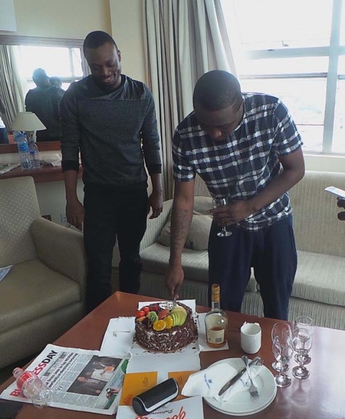 Chopstix standing beside Ice Prince while he is cutting his birthday cake. Photo: BHM