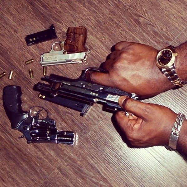 Jude Okoye shows off his firearms