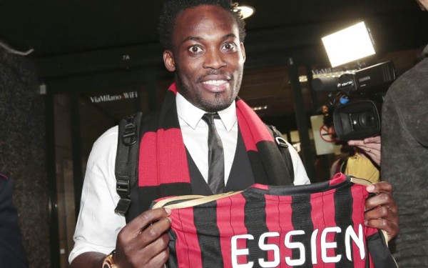 Michael Essien holds up his new jersey. Photo - Oman Observer