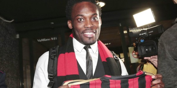 Michael Essien holds up his new jersey. Photo - Oman Observer