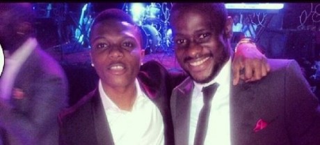 Pop star Wizkid and manager Godwin Tom in Abuja, November 2013. Photo: Instagram/Godwin Tom