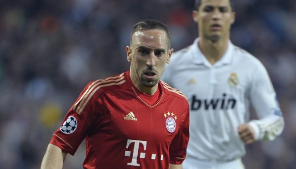 Frank Ribery (Ronaldo in the background)