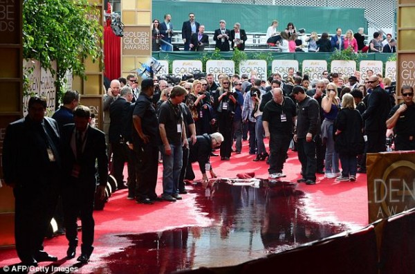 Members of the press awaiting the arrival of Hollywood's biggest stars watched as the sewage water rushed on the red carpet. Sewage flood messes red carpet as Golden Globes 2014!