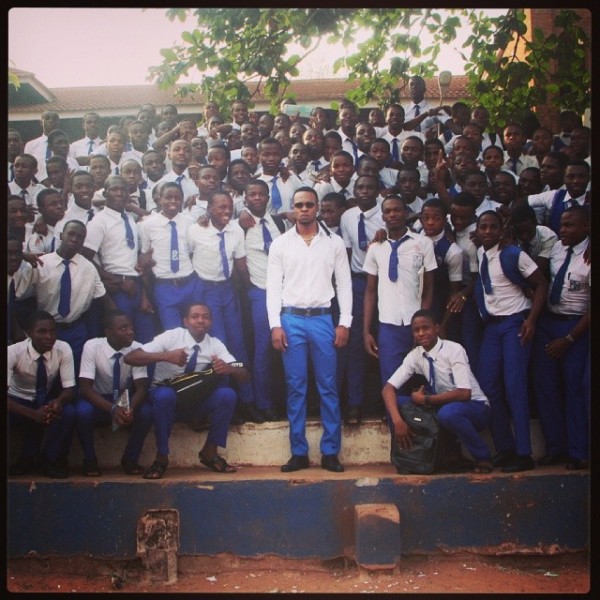 Flavour visits alma mater in school uniform (3)
