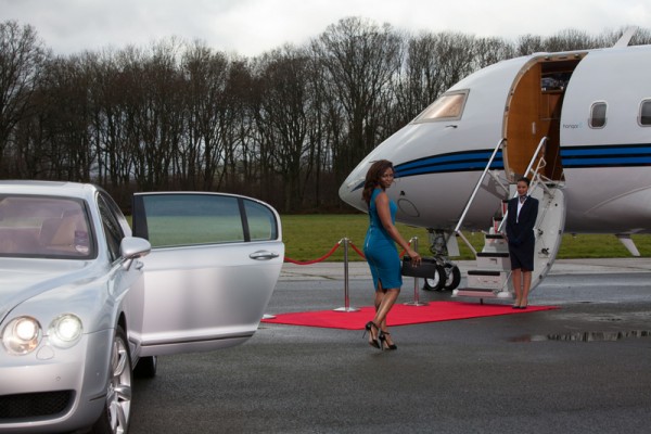 Genevieve walking towards the plane 2