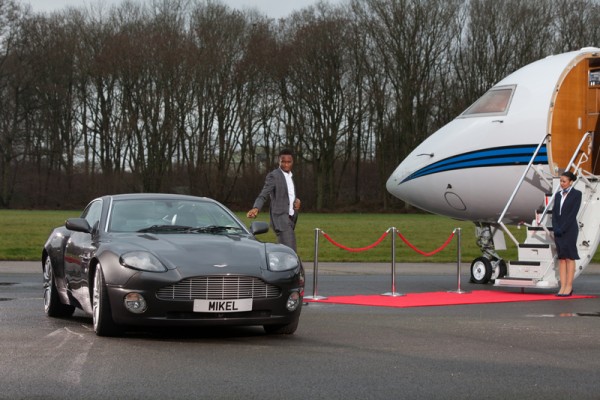 Mikel steps out of his car