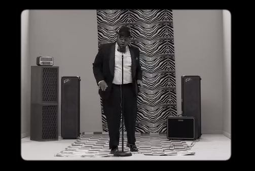 Tumi on the set of 'Asinamali'. Photo: YouTube