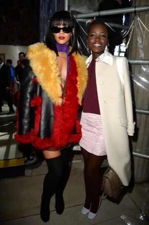 Rihanna and Lupita pose for a photo at the Miu Miu fashion show in Paris