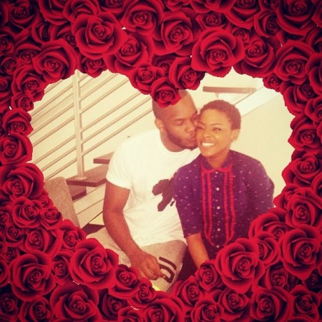 Rapper, Lynxx giving Singer, Chidinma, a passionate peck on the cheek