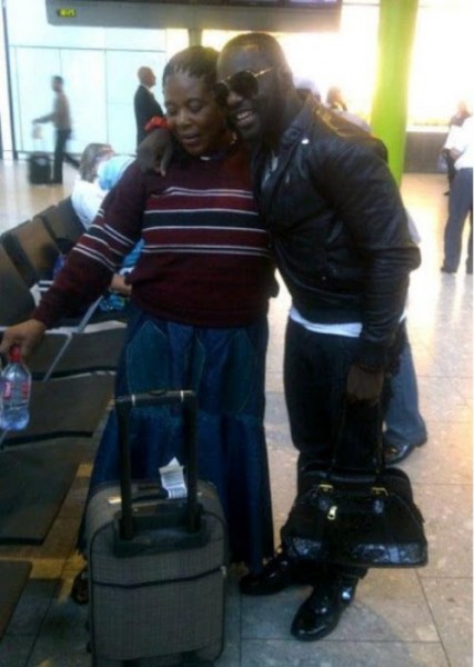 Jim Iyke and mother at the airport Photo: Momo