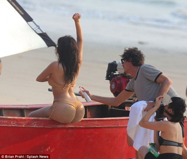 Kardashian reveals her bum in tiny bikini for beach shoot (10)