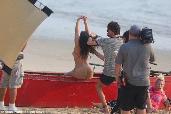 Kardashian reveals her bum in tiny bikini for beach shoot (11)
