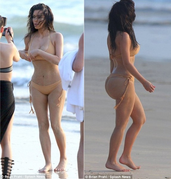 Kardashian reveals her bum in tiny bikini for beach shoot (20)