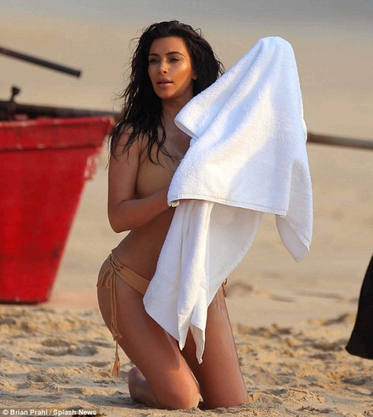 Kardashian reveals her bum in tiny bikini for beach shoot (3)