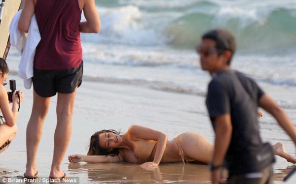 Kardashian reveals her bum in tiny bikini for beach shoot (8)