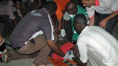 One of the bombing victims is put on a stretcher. Photo - Daily Nation One of the bombing victims is put on a stretcher. Photo - Daily Nation