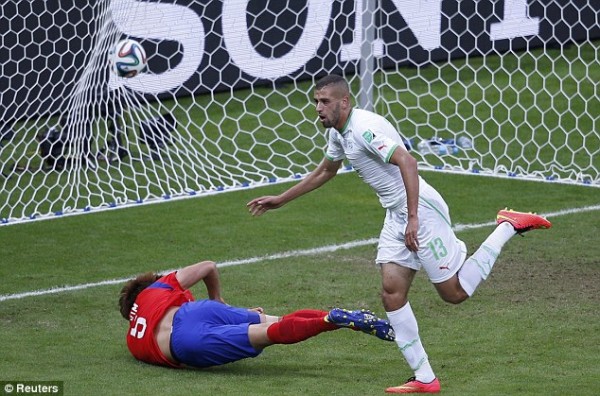 Algeria's Islam Slimani scores the opening goal