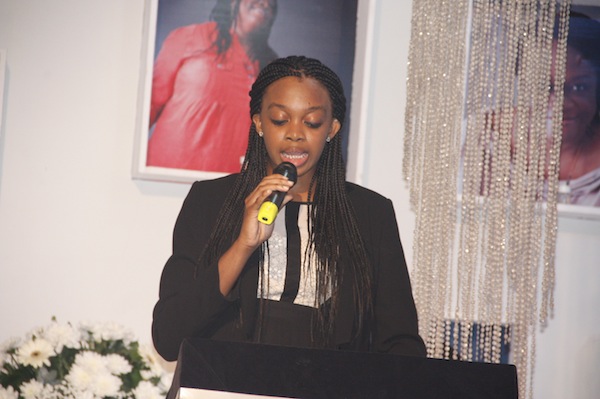 Ruby Igwe rendering her message at her late mum Amaka Igwe's tribute night