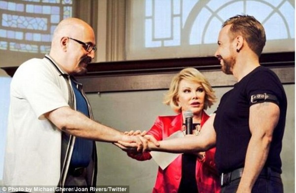 Joan Rivers shared a photo via Twitter on Tuesday showing her officiating an impromptu gay marriage at a book signing in New York City