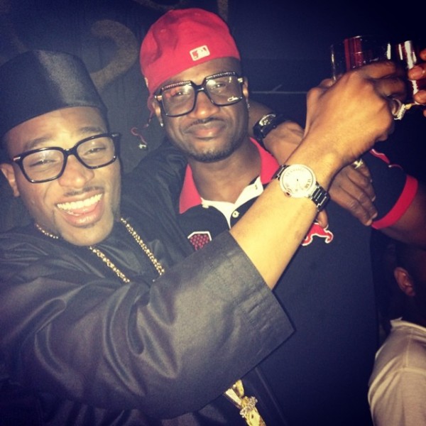 Celebration mood! D'banj and Peter share a drink