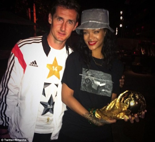 Rihanna breaks FIFA rules, touches World Cup trophy