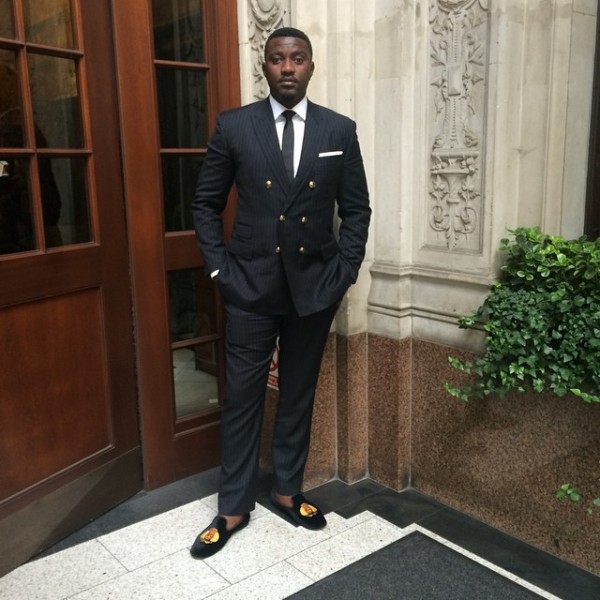 john-dumelo in a suit