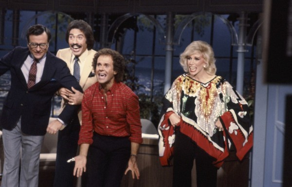 Political comedian Mark Russell, musical guest Tony Orlando, fitness expert Richard Simmons and Rivers on The Tonight Show Starring Johnny Carson in 1981.