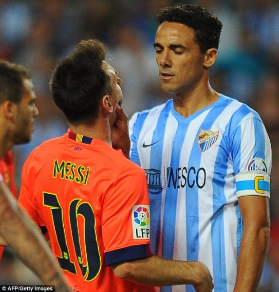 Referee Alejandro Hernandez gave Weligton a yellow card after he grabbed Messi's cheeks