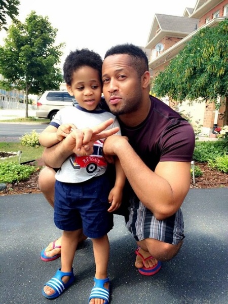 Mike Ezuruonye and son. Photo: Mjem