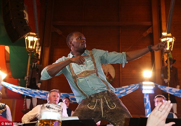The Jamaican athlete received cheers as he did his signature pose to excited onlookers