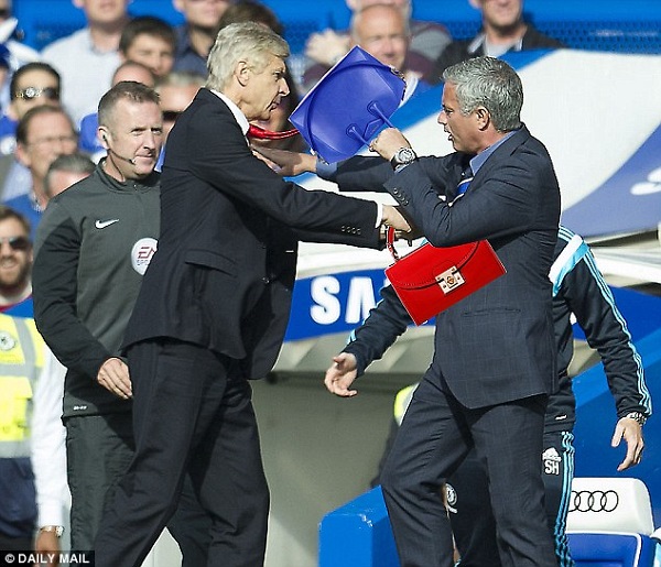 There was plenty of handbags in this scuffle as Wenger pushed Mourinho on the Stamford Bridge sidelines