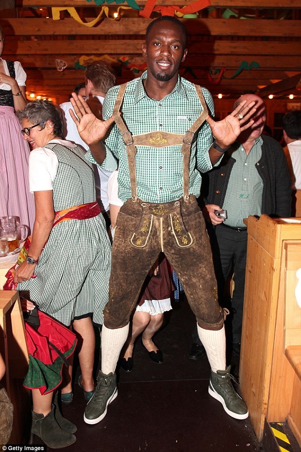 Usain swapped his Lycra for a Lederhosen which he teamed with a pair of olive green trainers