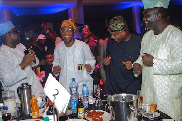 Govr. Rauf Aregbesola and Prince Obiru dancing